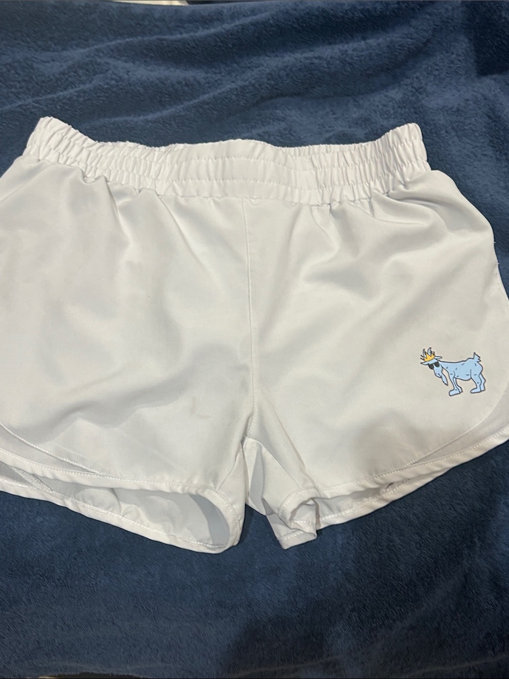 GOAT White Athletic Shorts with Blue Moose Graphic